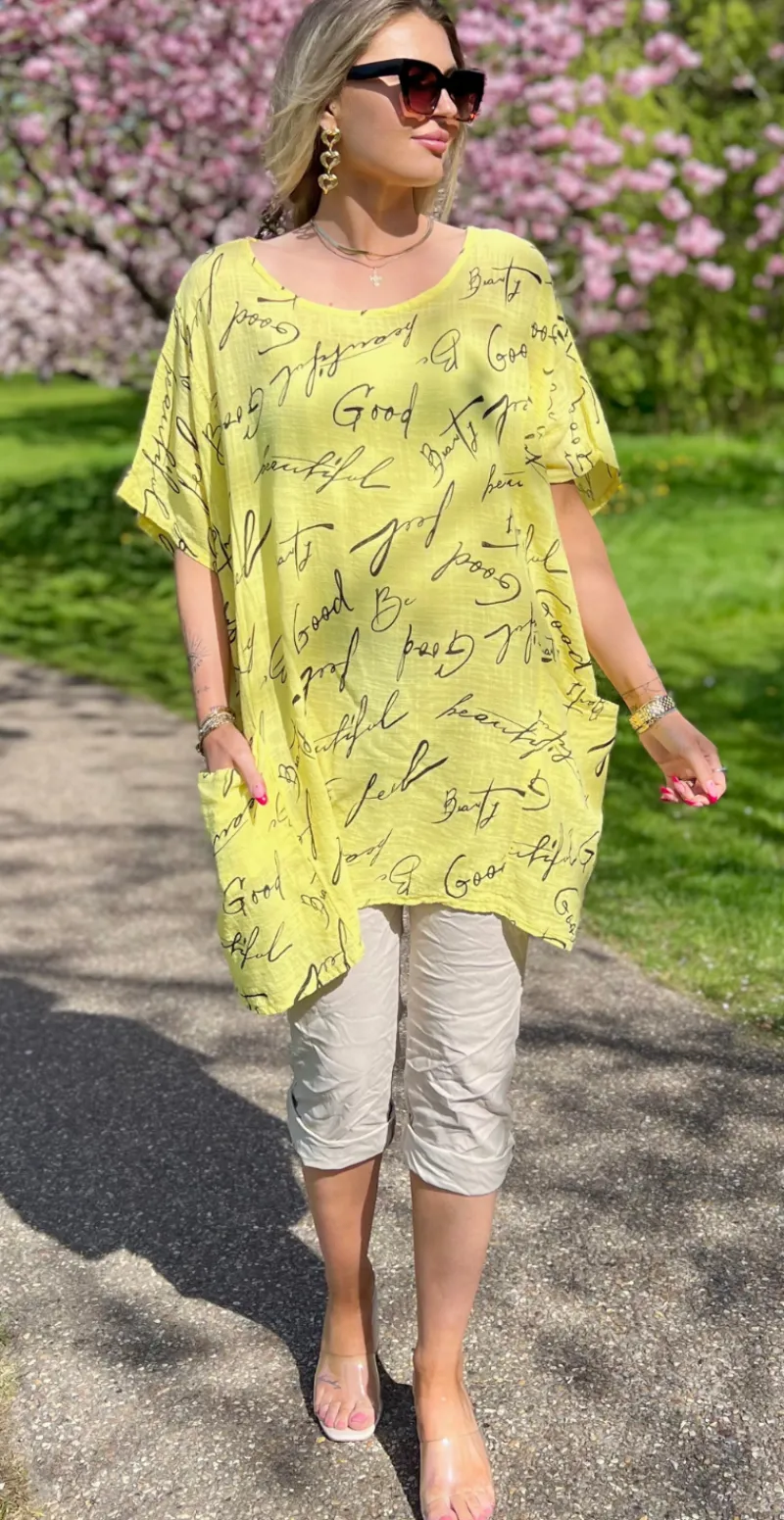 Dicte bluse med vidde, lommer og skrift gul LikeLondon