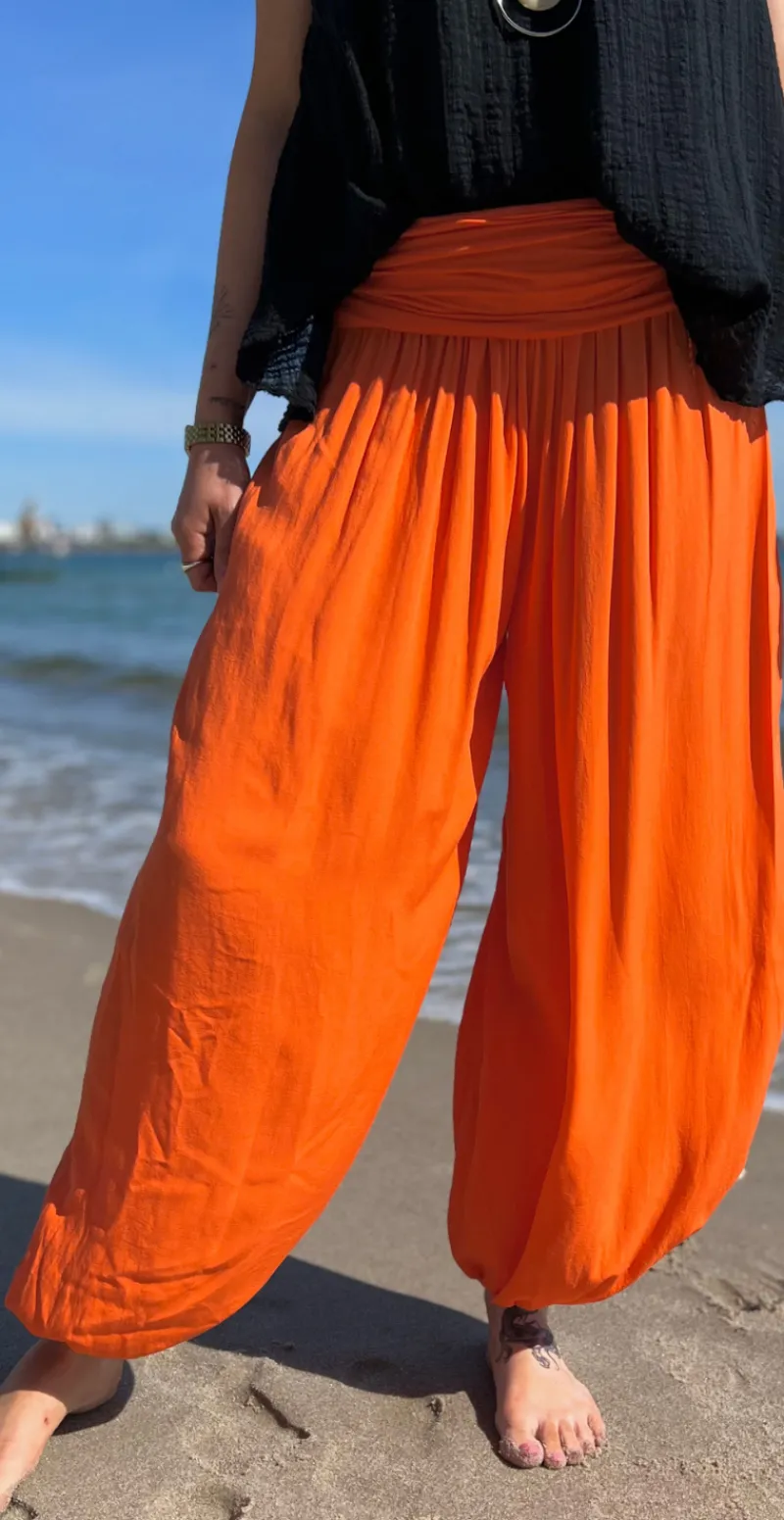 Jill buks med elastik ved talje og fod orange Likelondon