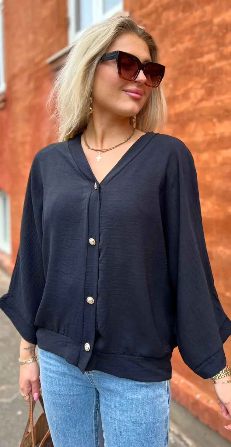 Tiffany bluse med guldknapper sort LikeLondon