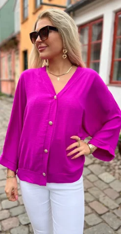 Tiffany bluse med guldknapper magenta LikeLondon