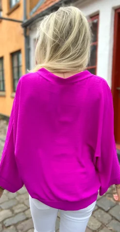 Tiffany bluse med guldknapper magenta LikeLondon